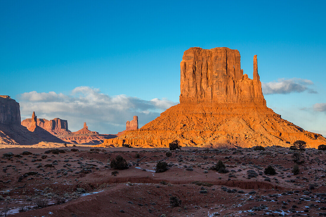 The Utah monuments and the West Mitten in the Monument Valley Navajo Tribal Park in Arizona.