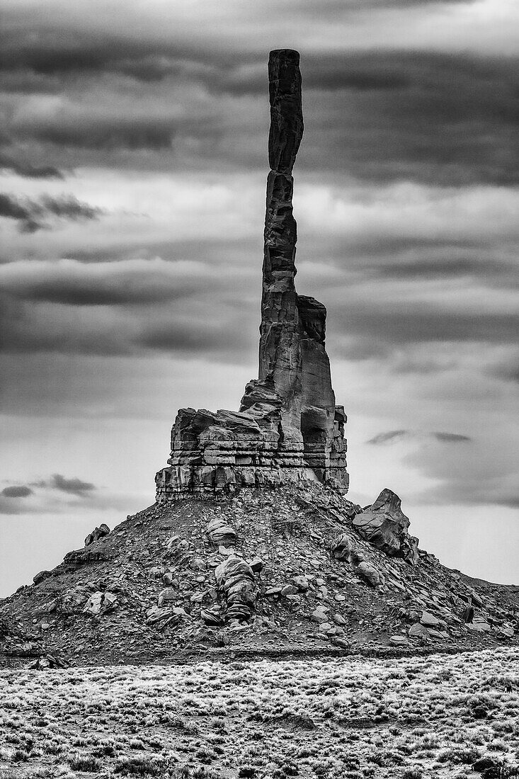 The Totem Pole on a cloudy day in the Monument Valley Navajo Tribal Park in Arizona.