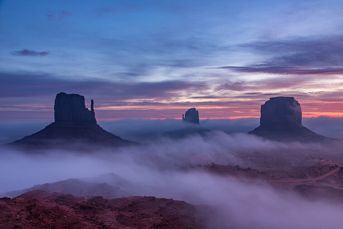 Foggy sunrise in the Monument Valley Navajo Tribal Park in Arizona.