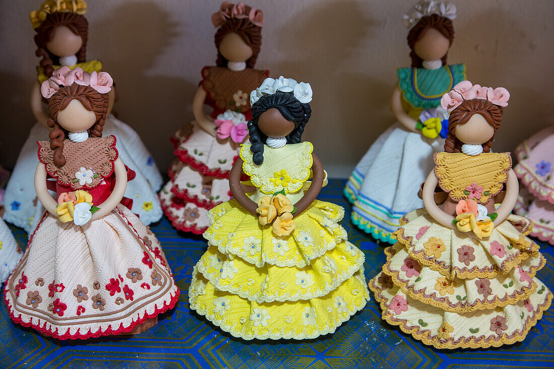 Dominican faceless dolls in a home workshop in the Dominican Republic. The faceless dolls represent the ethnic diversity of the Dominican Republic.