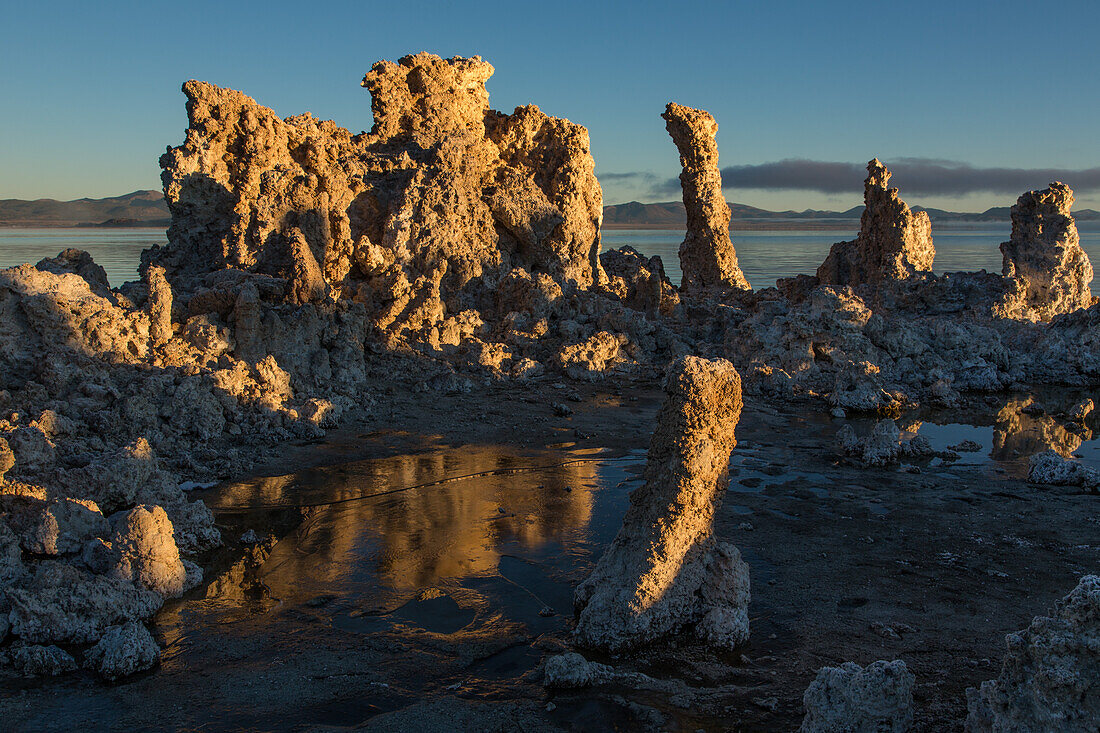 Tufa rock formations at sunrise in Mono Lake in California.