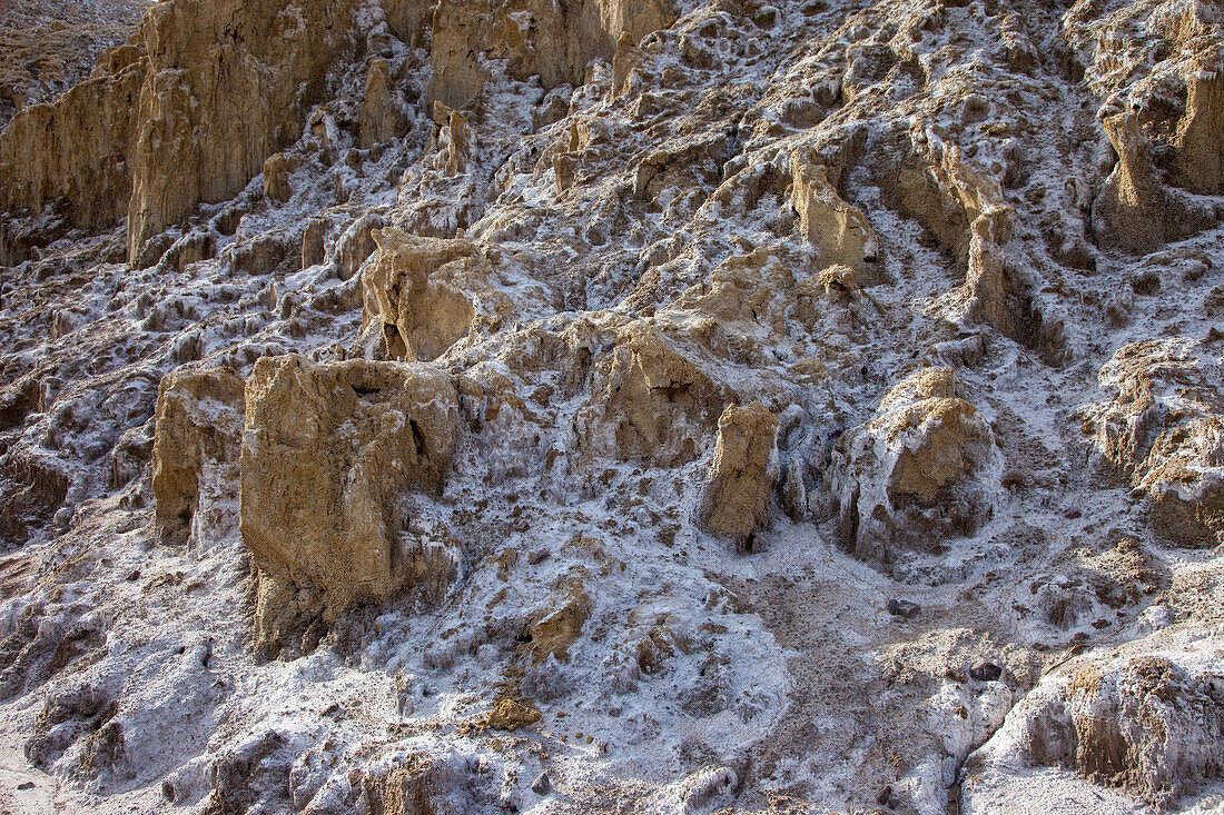 Mineral salt formations on the surface of the ground at Furnace Creek in Death Valley National Park in California.