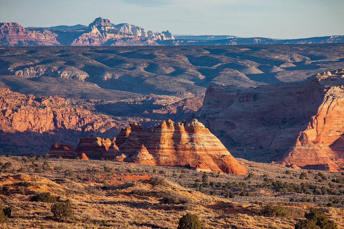 Sunrise light on the North Teepees, Navajo sandstone formations in North Coyote Buttes, Vermilion Cliffs National Monument, Arizona.
