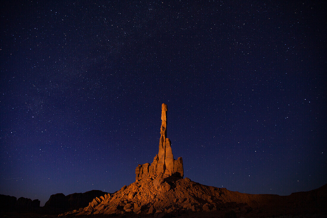 Stars over the Totem Pole at night in the Monument Valley Navajo Tribal Park in Arizona.