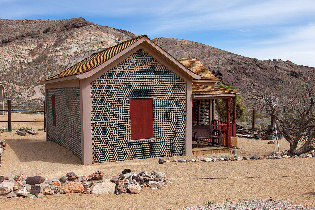 The Bottle House in the ghost town of Rhyolite, Nevada, was built by a miner in 1906 from 50,000 discarded beer & liquor bottles. An early example of glass recycling.