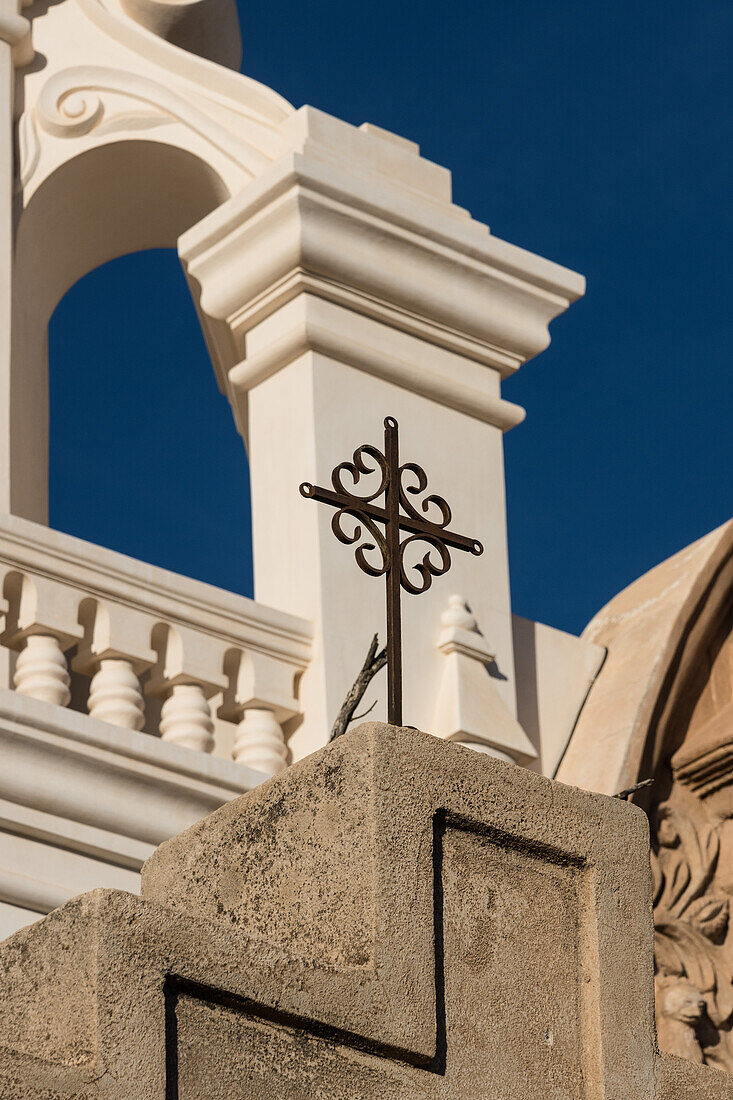 Detail of a metal cross on the Mission San Xavier del Bac, Tucson Arizona.