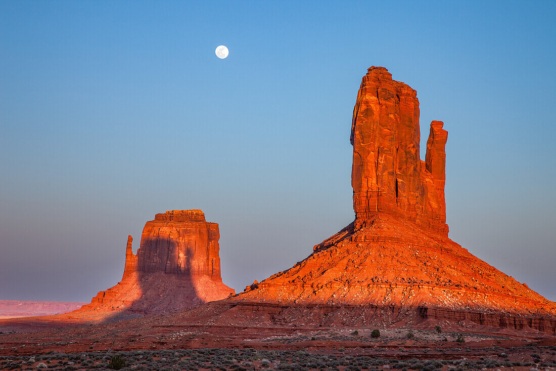 Shadow of the West Mitten projected onto the East Mitten at sunset in the Monument Valley Navajo Tribal Park in Arizona. This phenomenon occurs twice per year.