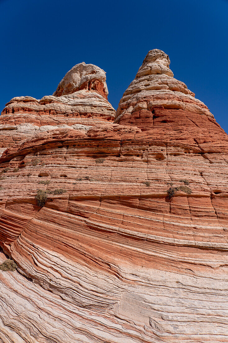 A teepee-shaped sandstone rock formation in the White Pocket Recreation Area, Vermilion Cliffs National Monument, Arizona.