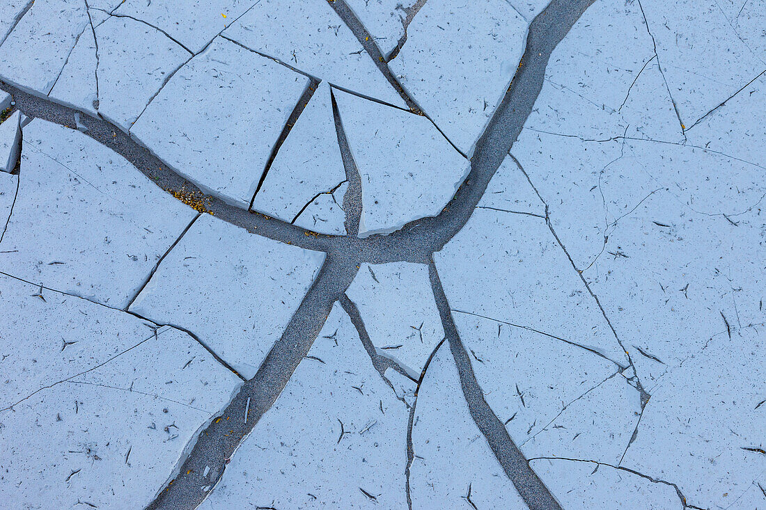 Cracks in the mud of a dry lake bed near Stovepipe Wells in Death Valley National Park in the Mojave Desert in California.