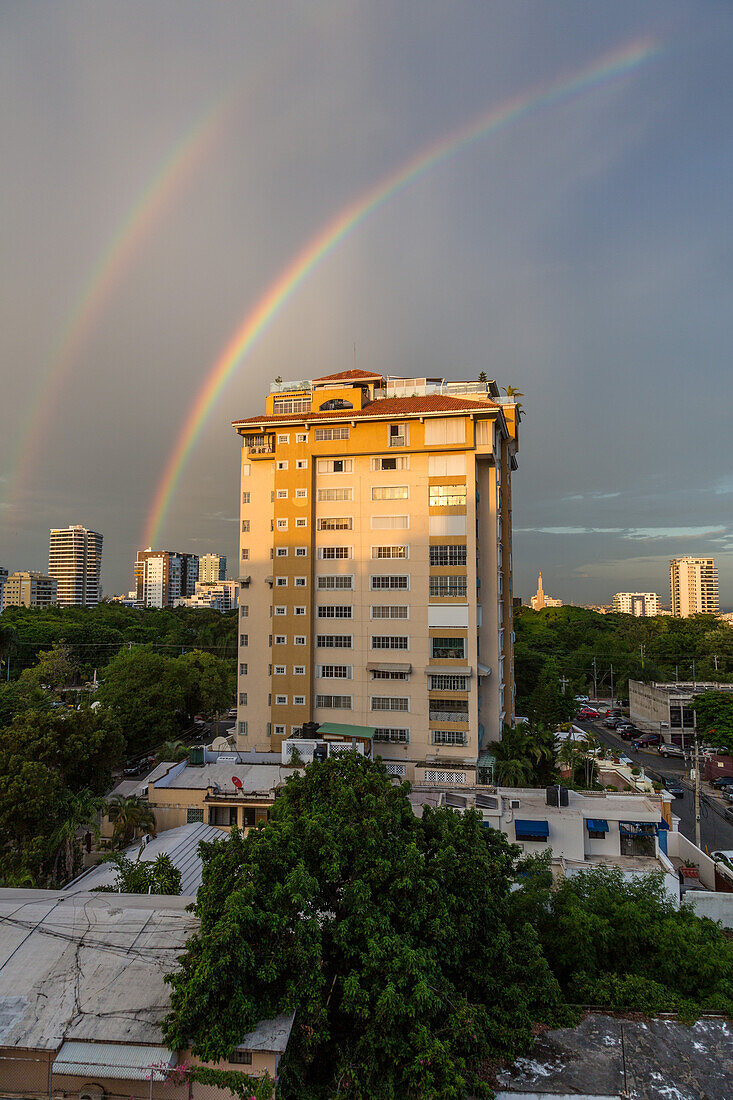 A double rainbow over apartment buildings in central Santo Domingo, Dominican Repbulic.