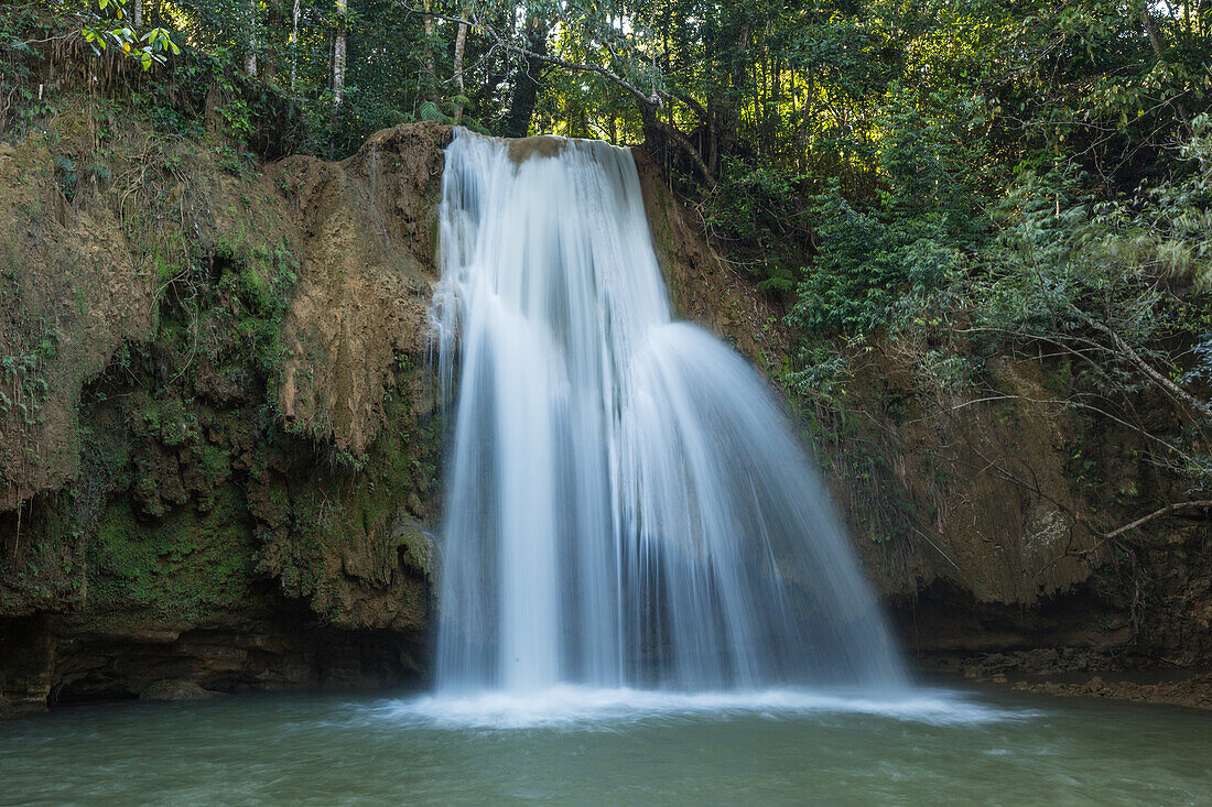 A smaller waterfall on the Limon River near the main waterfalls of El Limon in the Dominican Republic. A slow shutter speed was used to give the water this silky look.