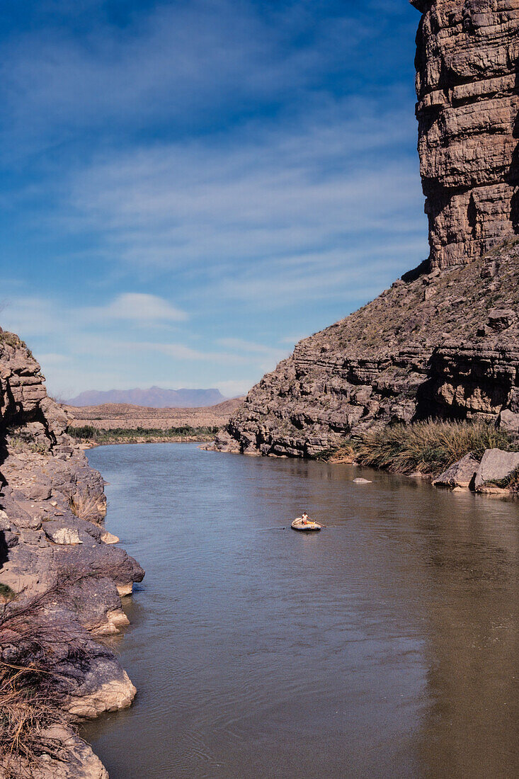 River rafting on the Rio Grande River in Santa Elena Canyon in Big Bend National Park with Mexico at right.