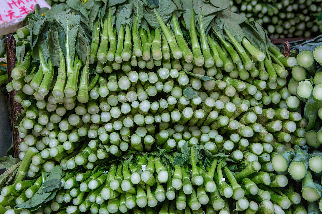 Yu Choy Sum, Brassica rapa var. parachinensis, for sale in a street market in Hong Kong, China.