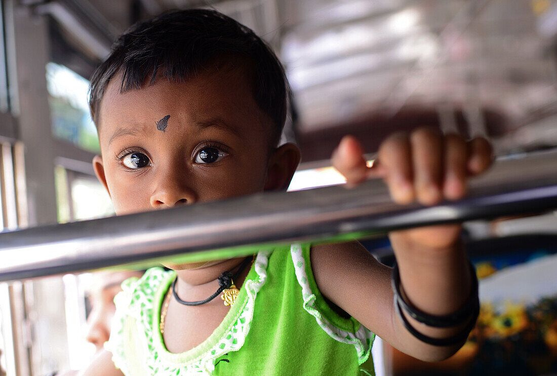 Cute young girl on the bus, Sri Lanka