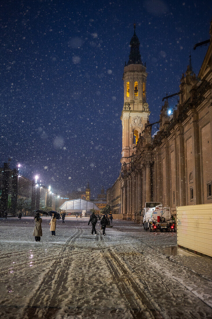 Snow falls over El Pilar Basilica during Storm Juan in Zaragoza, Spain