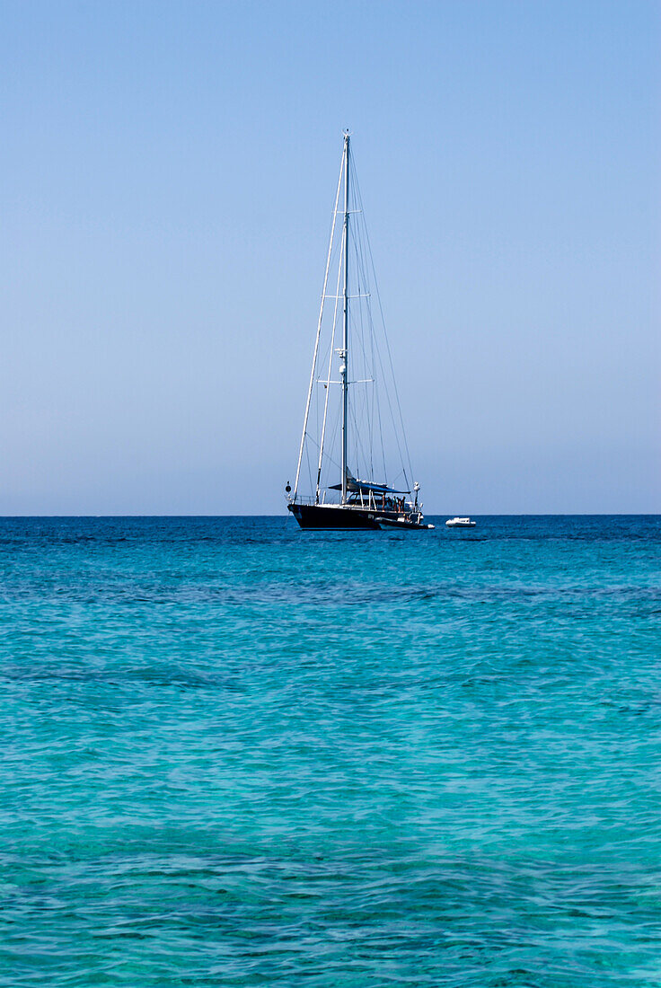 Sailing boat in Mitjorn, Formentera, Spain.