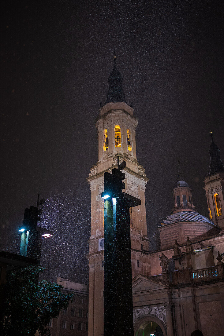 Snow falls over El Pilar Basilica during Storm Juan in Zaragoza, Spain