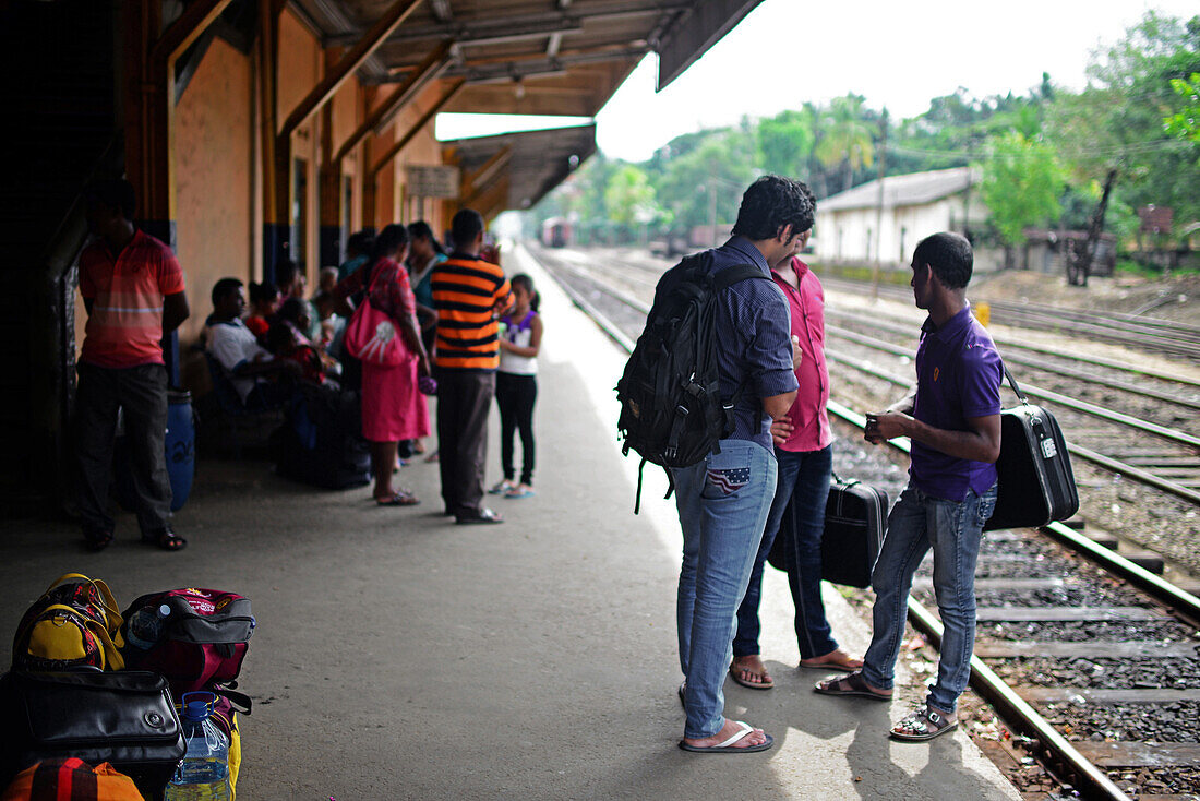 People in train station, Sri Lanka