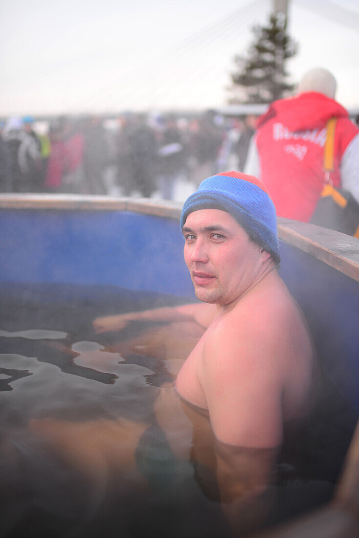 Swimmers recover in warm pool during Winter Swimming World Championships 2014 in Rovaniemi, Finland