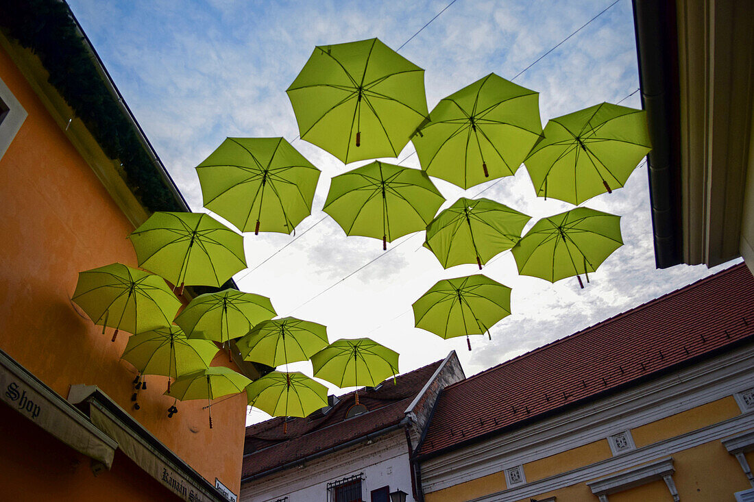 Umbrellas decorate the streets of Szentendre, a riverside town in Pest County, Hungary,
