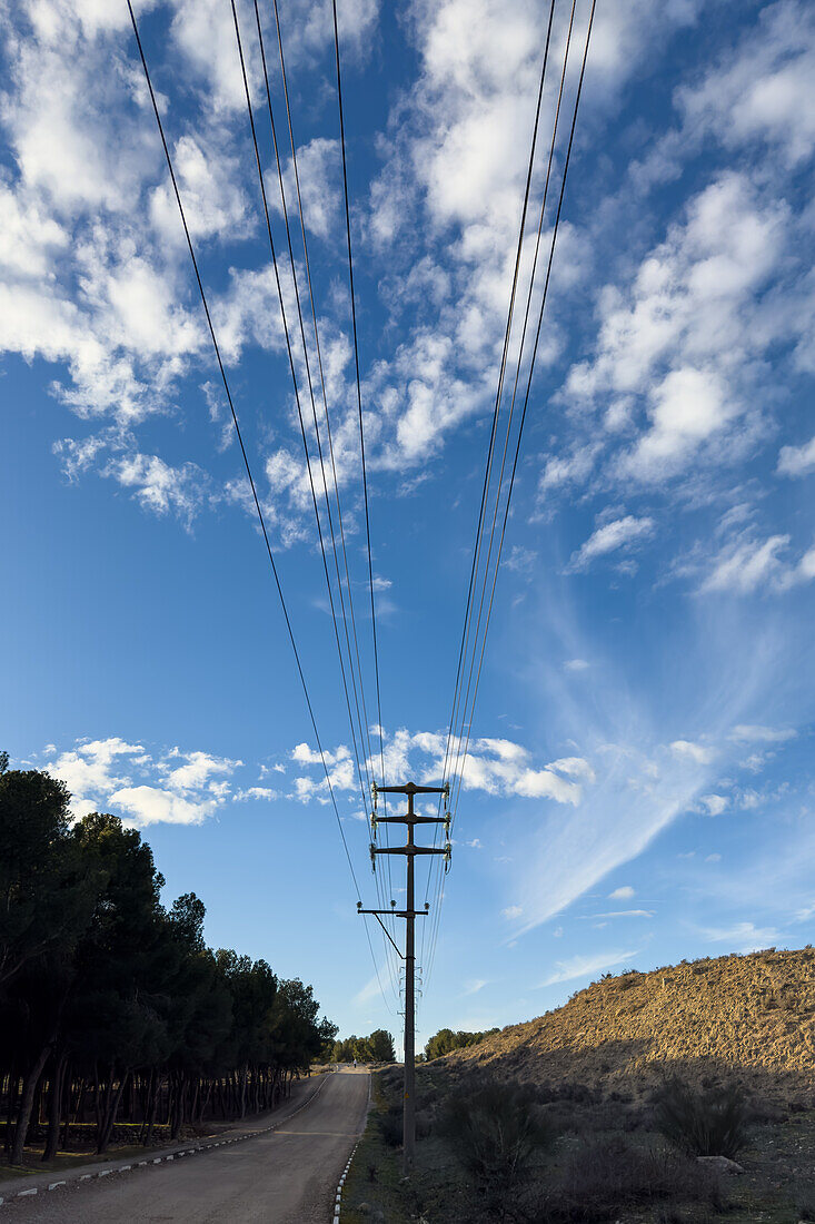 Electric post in rural landscape
