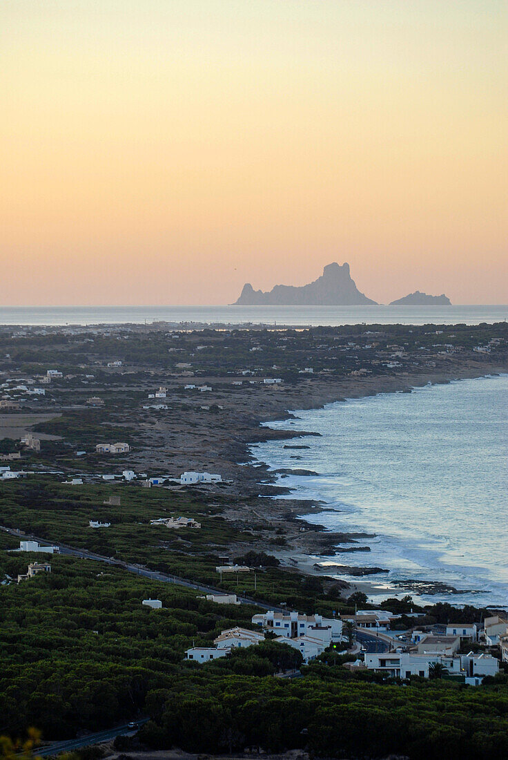 Sunset view of Es Vedra and part of Formentera from La Mola