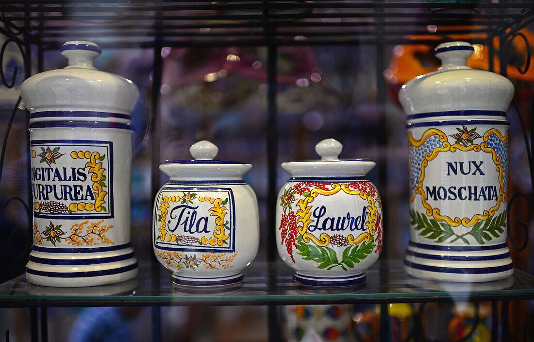 Spice jars in shop window, Granada, Spain