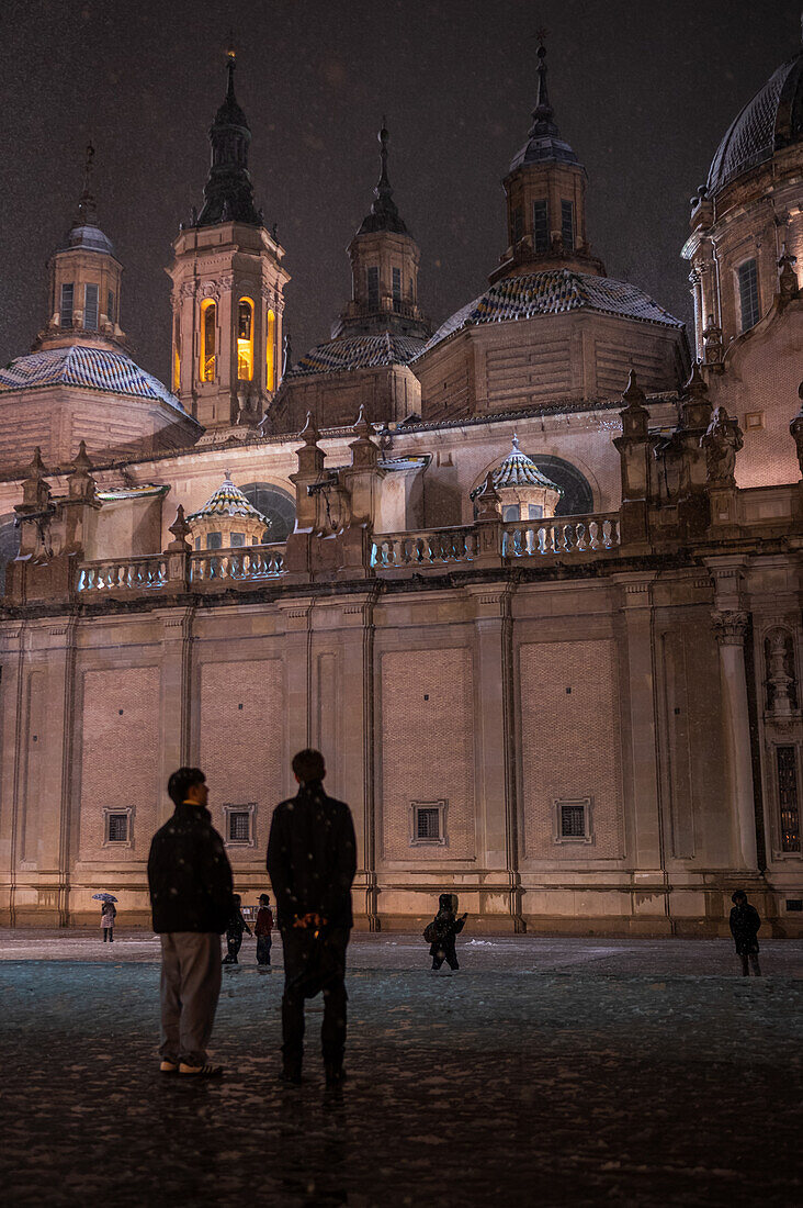 Snow falls over El Pilar Basilica during Storm Juan in Zaragoza, Spain