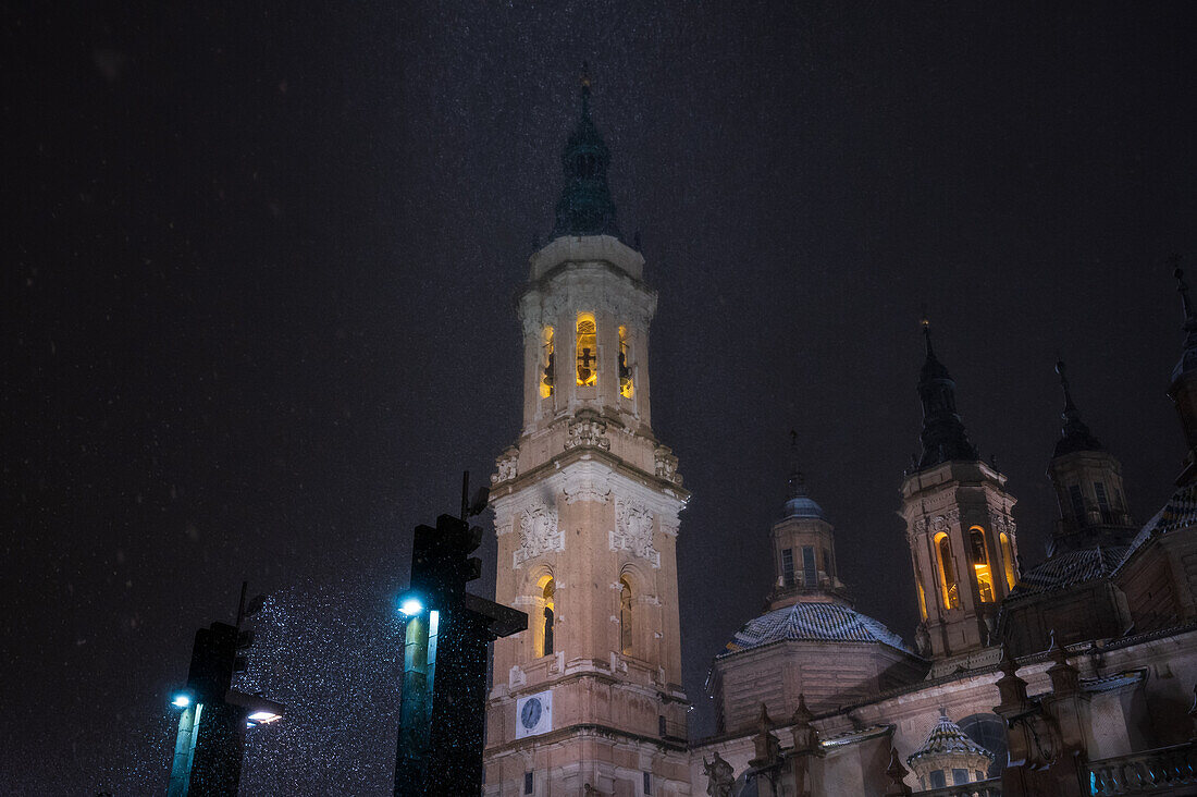 Snow falls over El Pilar Basilica during Storm Juan in Zaragoza, Spain