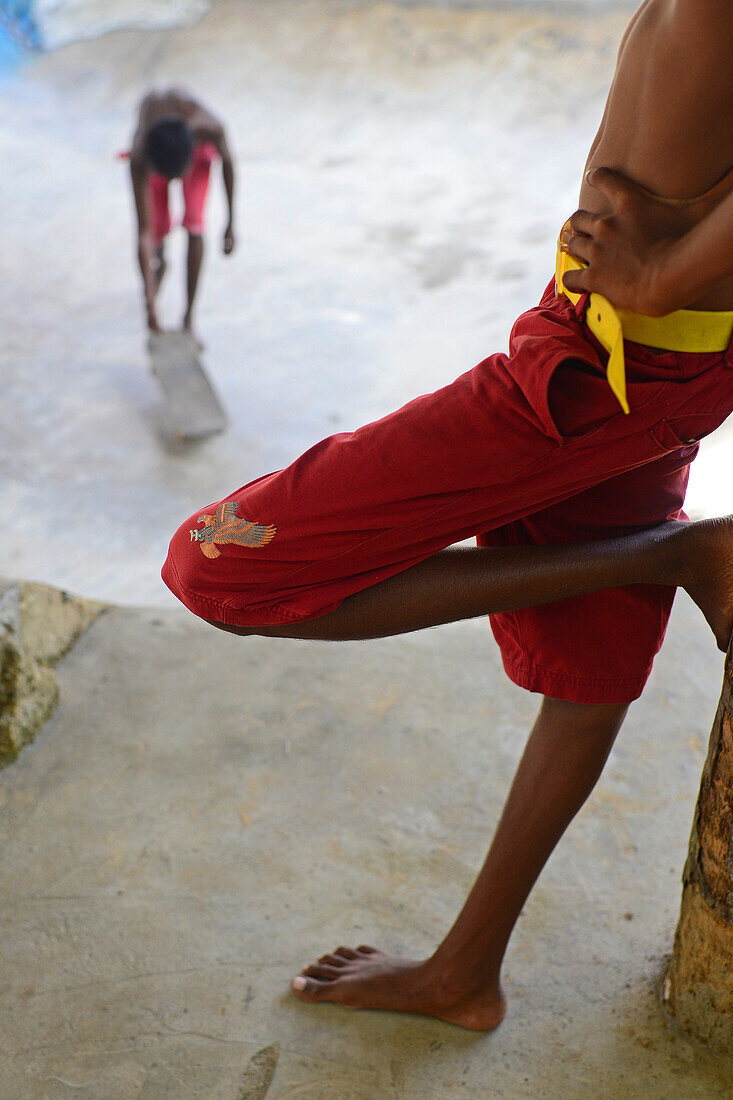 Young boys skateboarding in Midigama, Sri Lanka