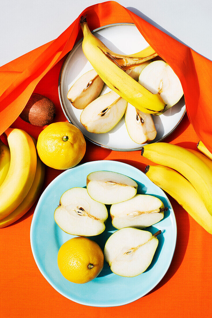 Overhead view of fruits on plates