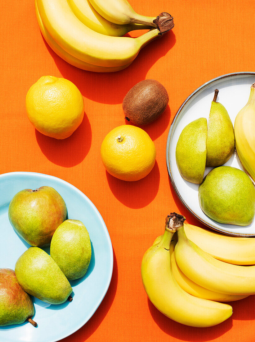 Overhead view of fruits on plates