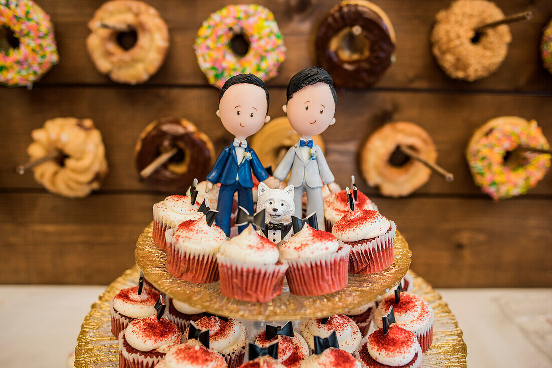 Wedding cupcake stand with two grooms