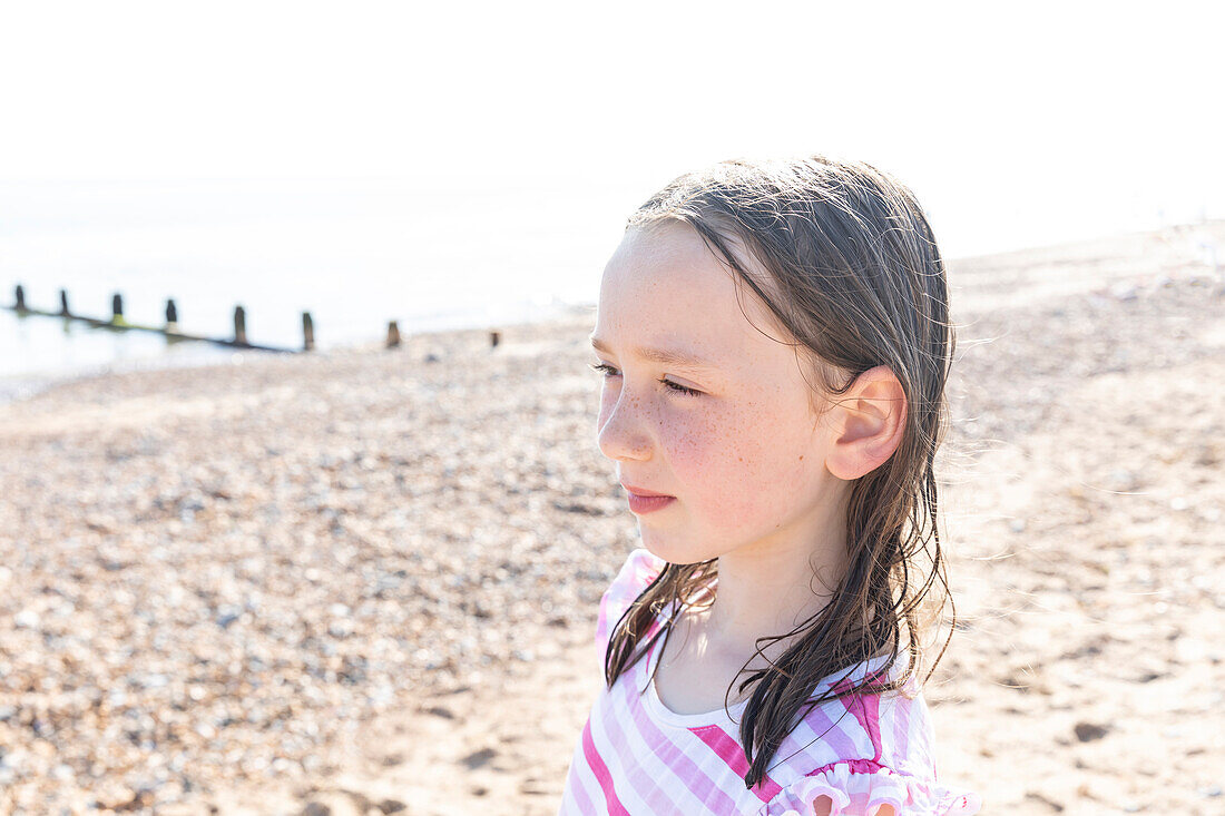 Girl (4-5) on beach