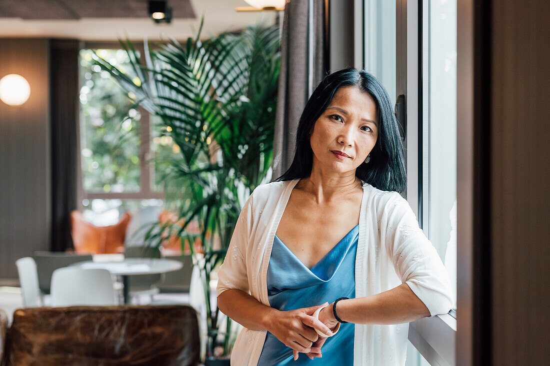 Italy, Portrait of businesswoman in creative studio