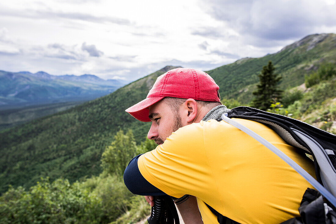 USA, Alaska, Hiker looking at view in Denali National Park