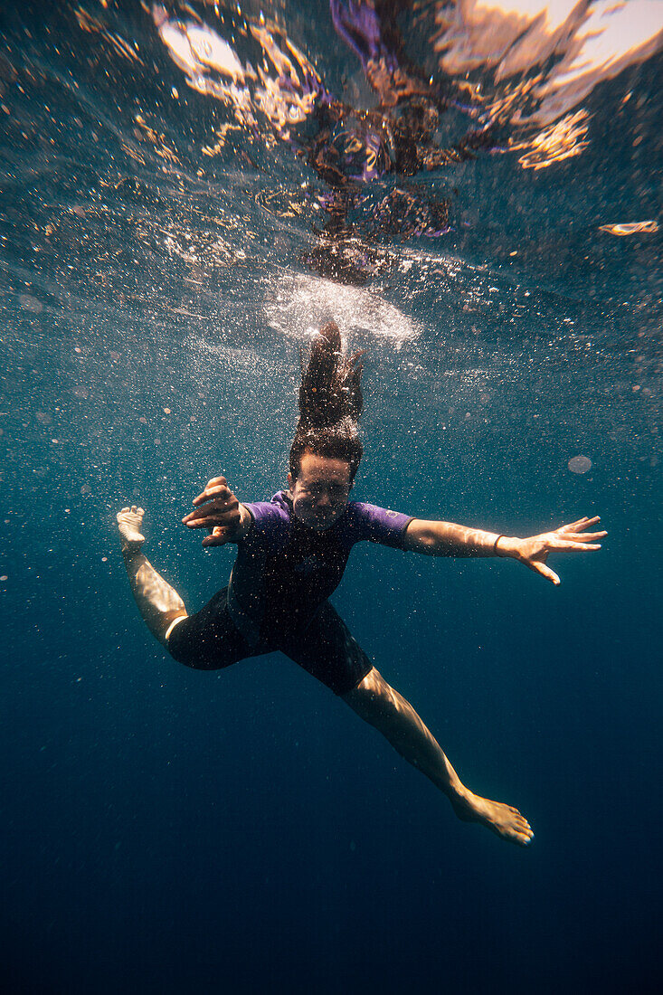 Woman diving in lake