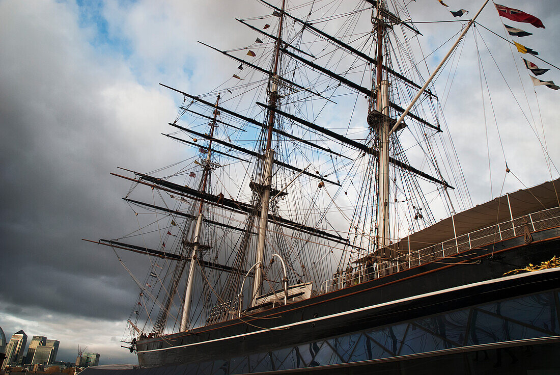 British Clipper Ship With The City Of London In The Background; London, England