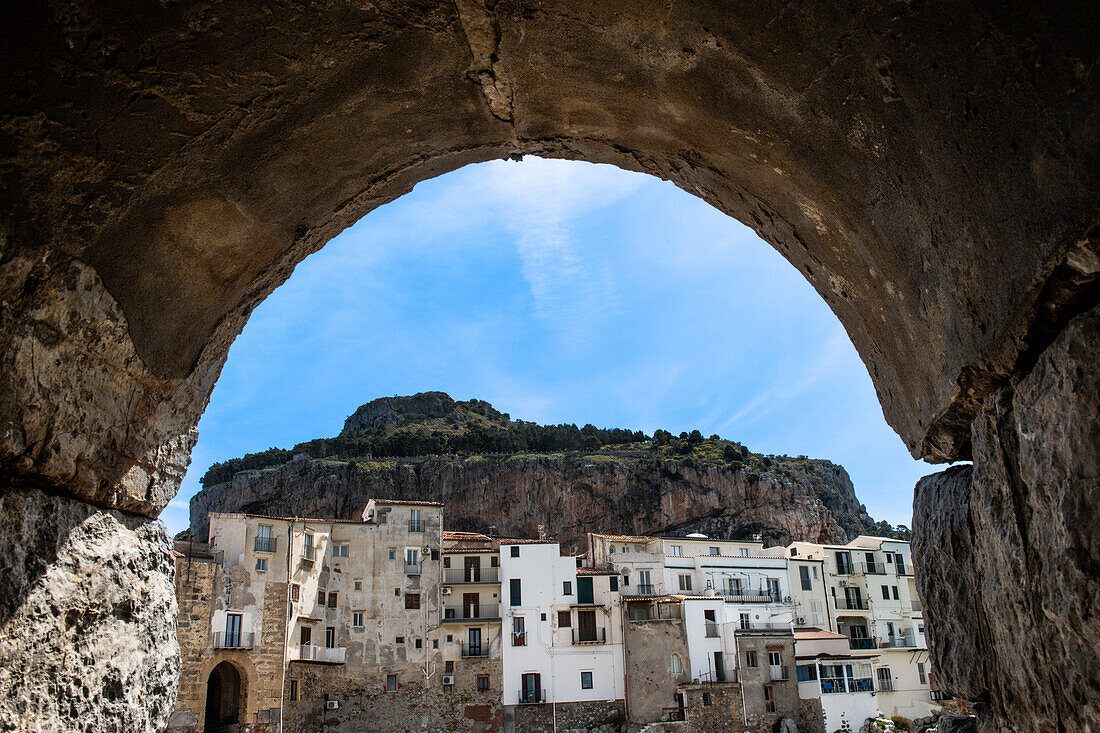 Italy, Sicily, Stone arch in old town