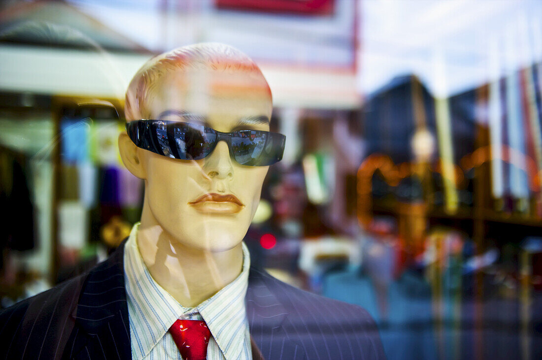 Male Mannequin In A Window Wearing Sunglasses; Bali, Indonesia