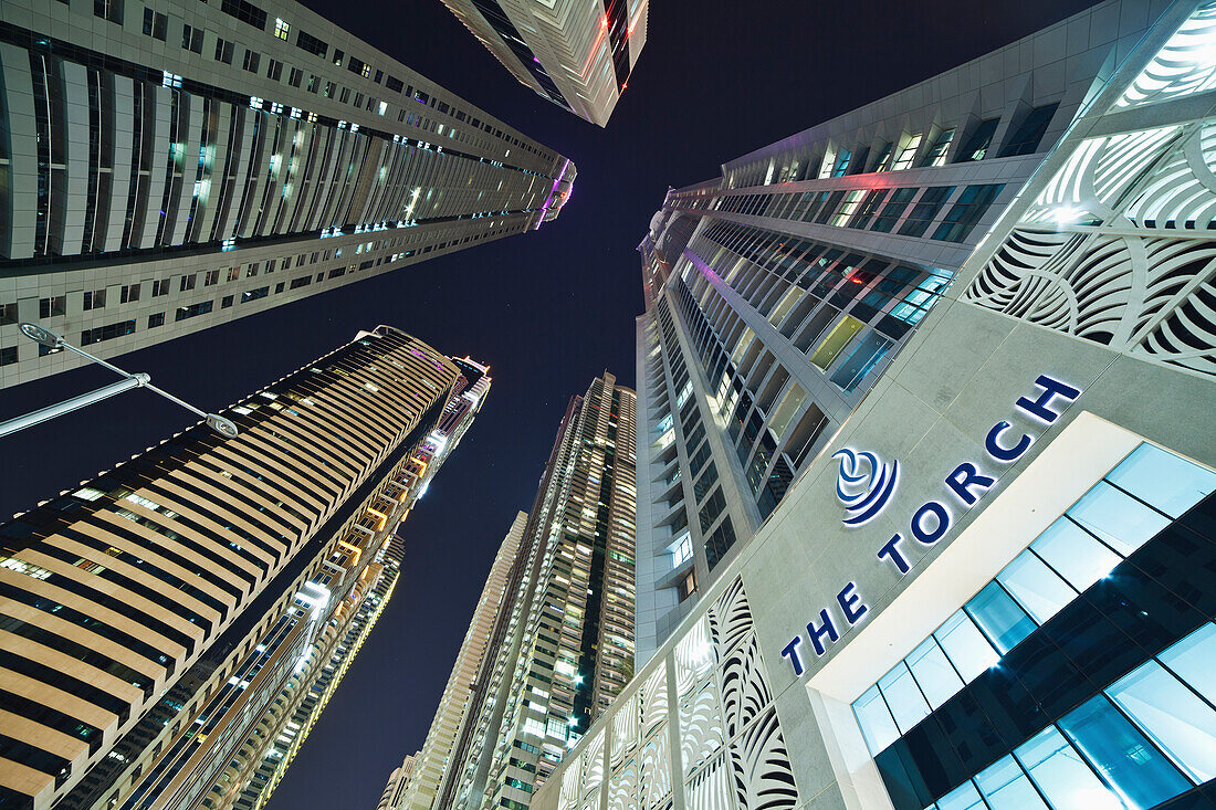 Low Angle View Of Skyscrapers At Nighttime; Dubai, United Arab Emirates