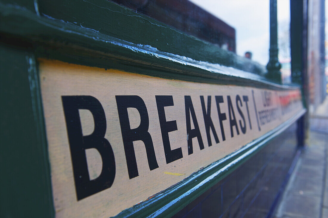 Sign For Breakfast Below A Window; London, England