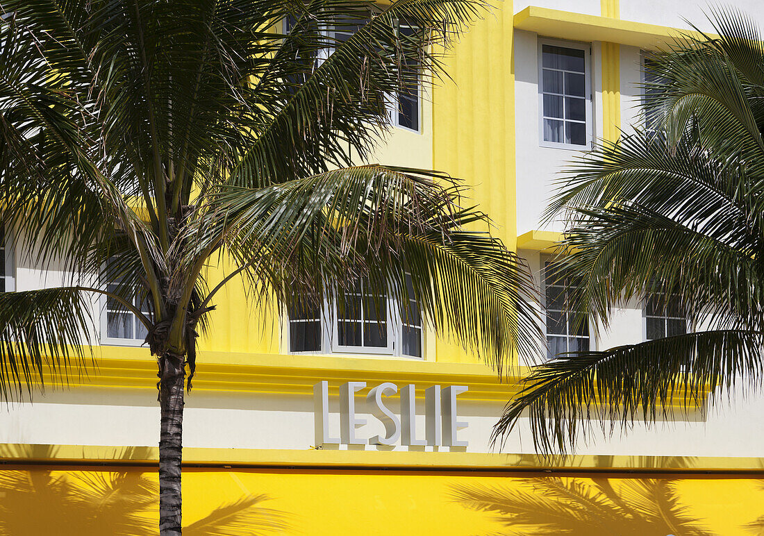 Bright Yellow Building With Palm Trees, South Beach; Miami, Florida, United States Of America
