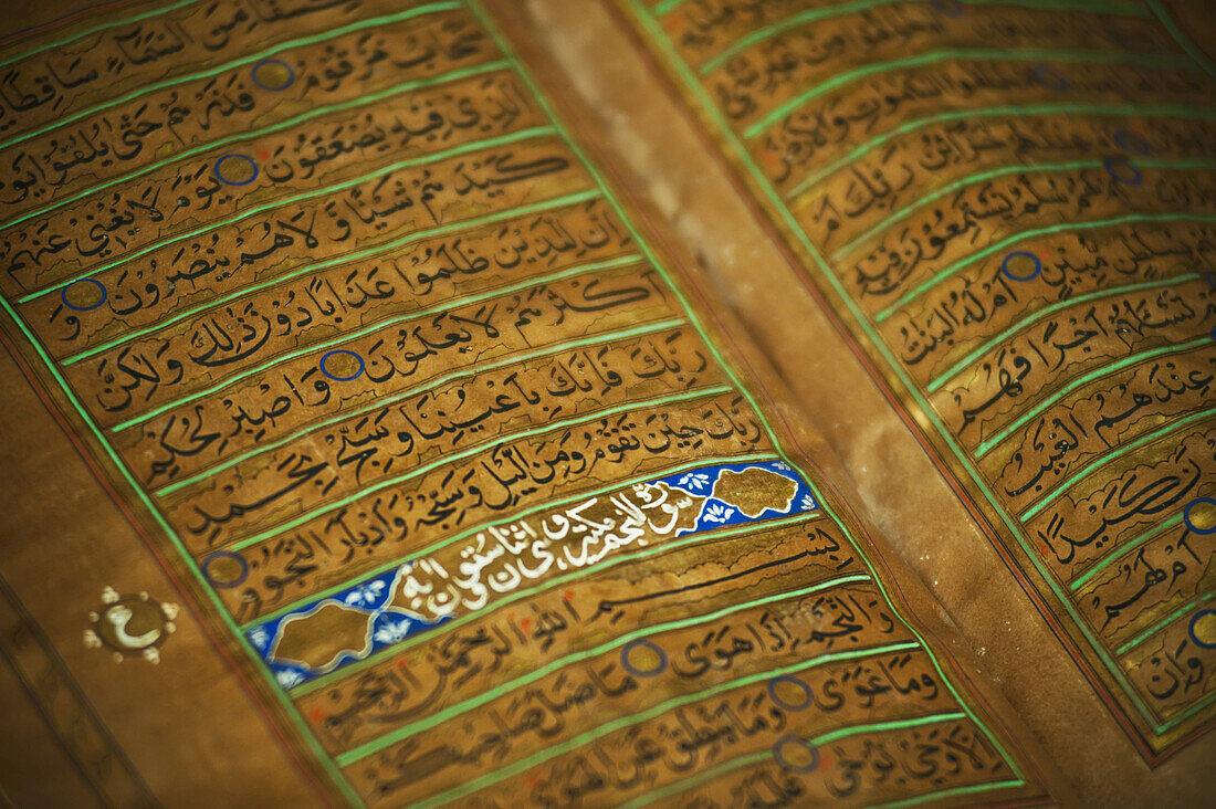 Intricate Text Of An Old Koran At Brunei's Dar Al-Salam's Islamic Museum; Bandar Seri Begawan, Brunei