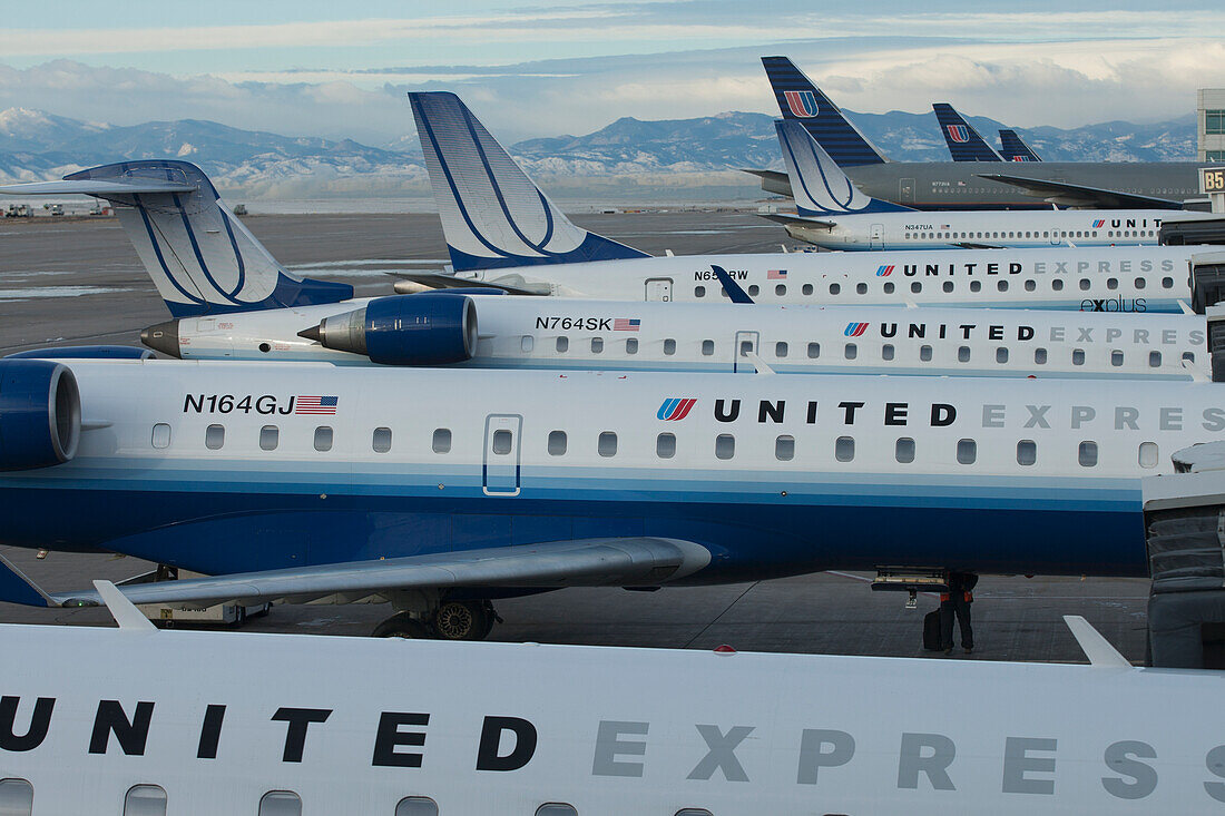 United Airlines Airplanes Parked In A Row At An Airport; Denver, Colorado, United States Of America