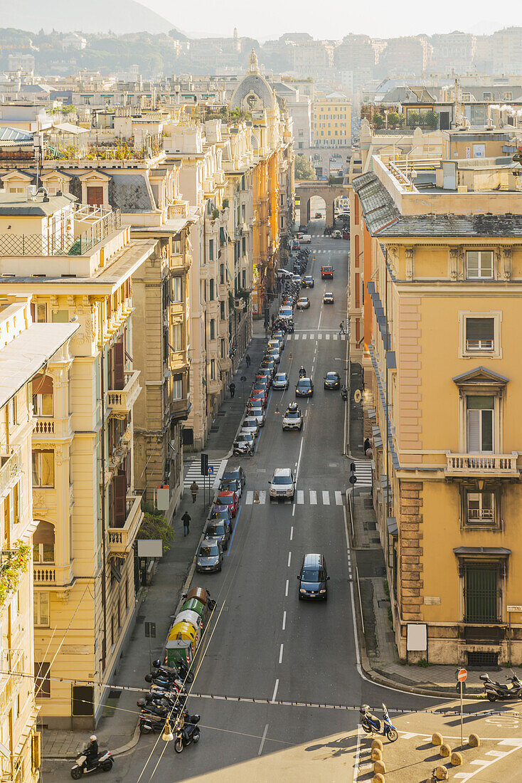 Residential And Retail Buildings Along A Busy Street; Genoa, Liguria, Italy