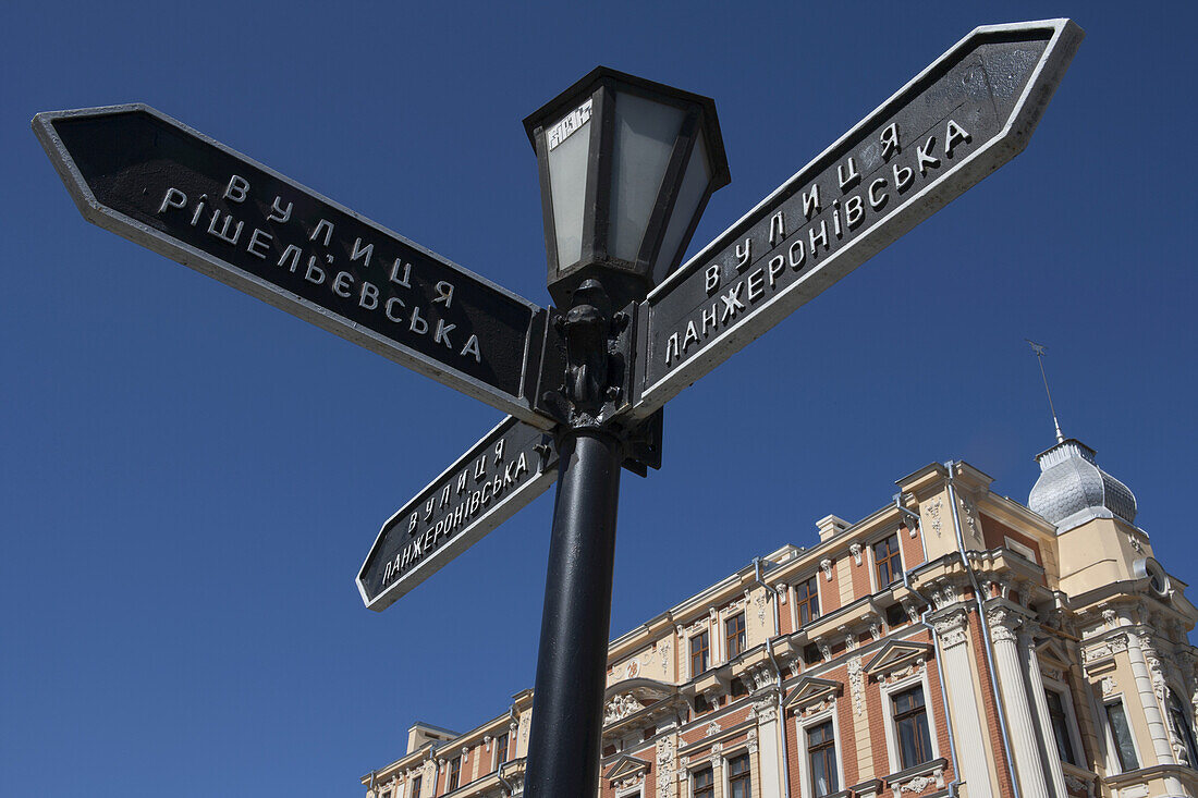 Signpost With Cyrillic Writing, Building In Neoclassical Style; Odessa, Ukraine