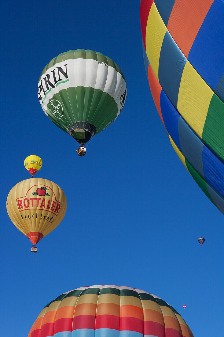 Hot Air Balloons Readying For Lift-Off During The Ski Resort's Annual Hot Air Balloon Festival; Filzmoos, Austria