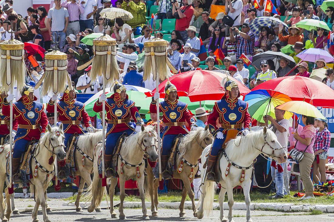 Honour Guard In Gala Uniform Riding On Horseback Carrying The Yesun Hult Tsagaan Tug (The Nine White Banners) At The Opening Ceremony Of The 2014 Naadam Mongolian National Festival Celebration In The National Sports Stadium, Ulaanbaatar (Ulan Bator), Mongolia