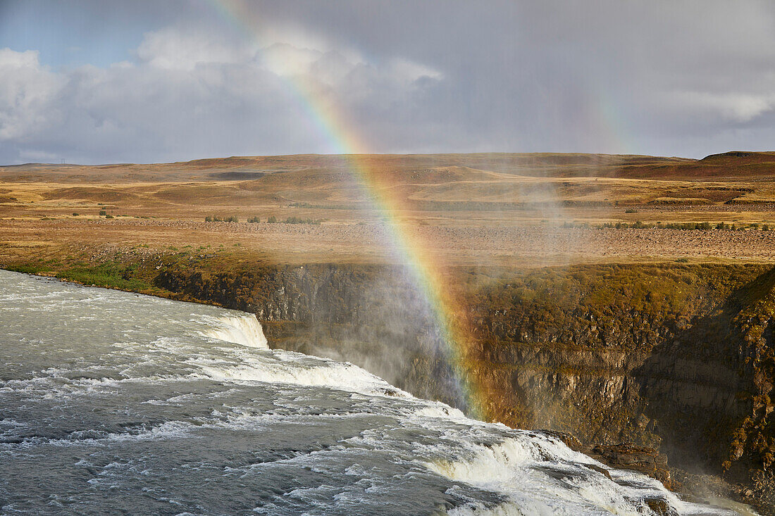 Rainbow in the mist over Gullfoss Falls in the Golden Circle of Iceland; Iceland